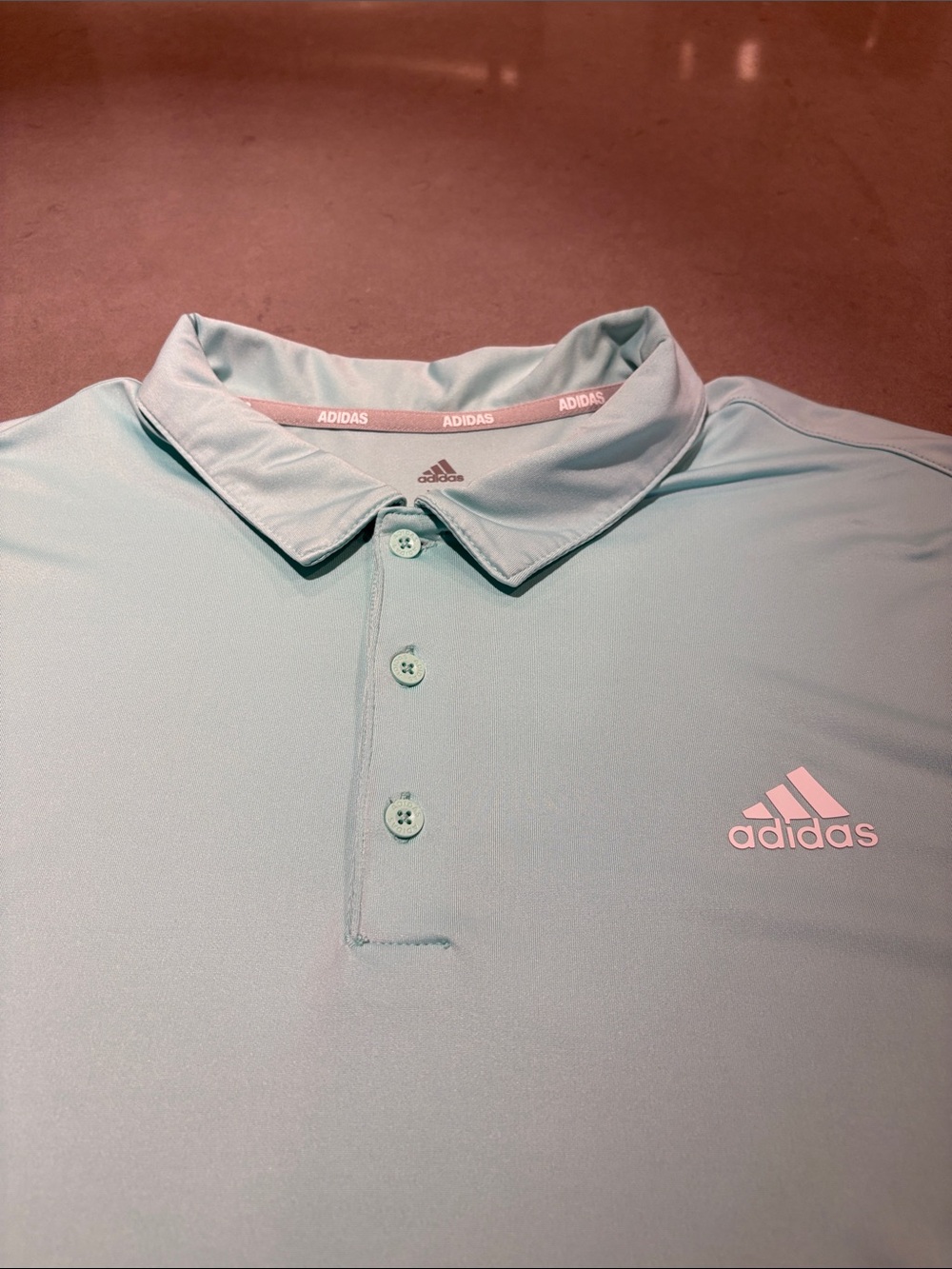 adidas Men’s Mint Green Polo with Pink Logo